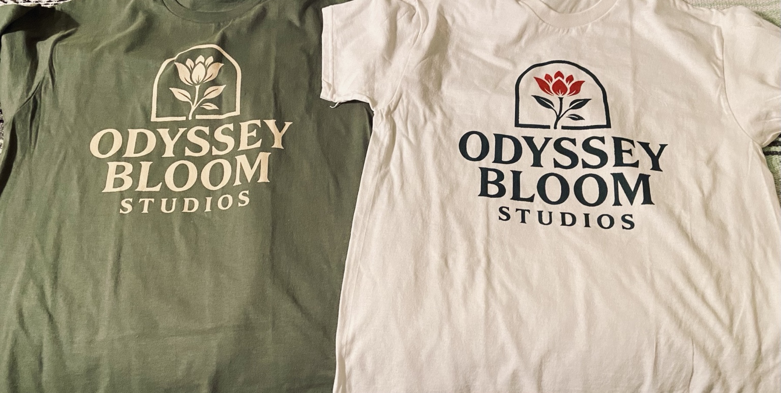 Green and cream Odyssey Bloom Studios shirts